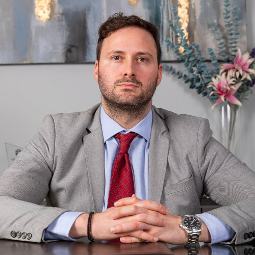 SPANOS - FOUSKARINIS AND ASSOCIATES LAW FIRM